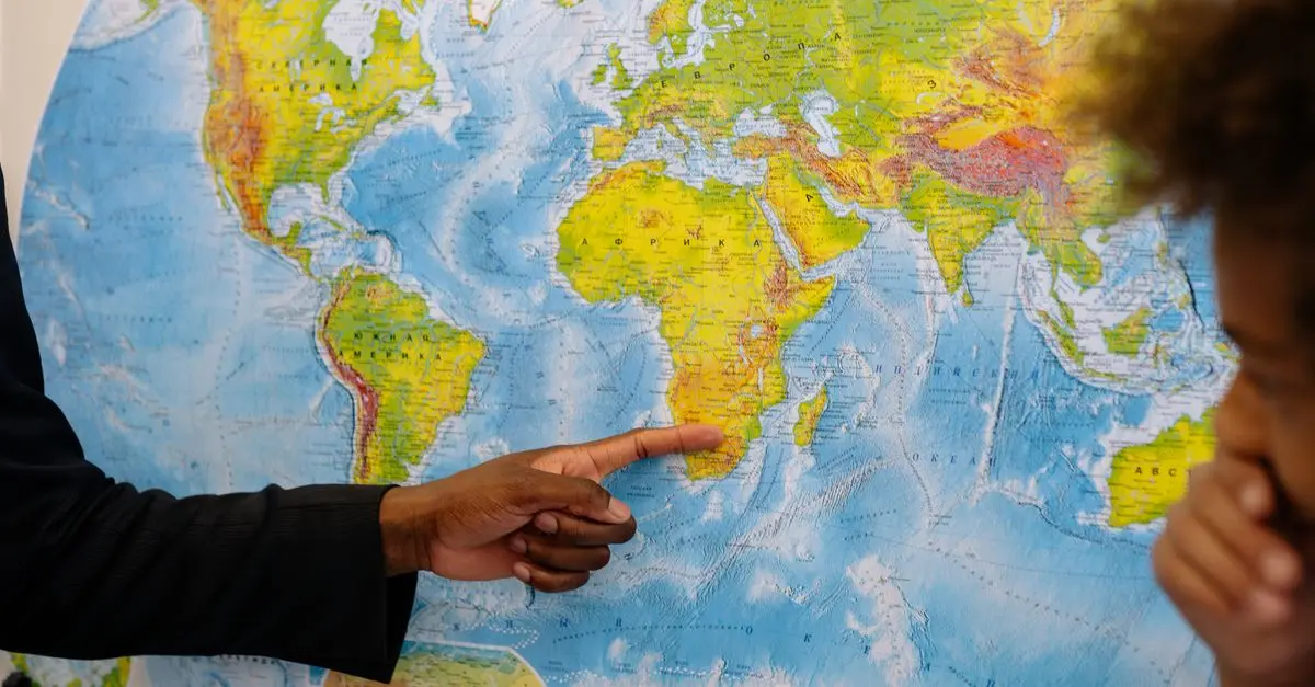 Comment interpréter les symboles d'un atlas géographique